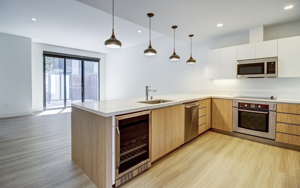 3 Bed 2.5 Bath Townhome + Den - 3 bedroom floorplan layout with 2.5 bathrooms and 2291 - 2399 square feet (Kitchen)